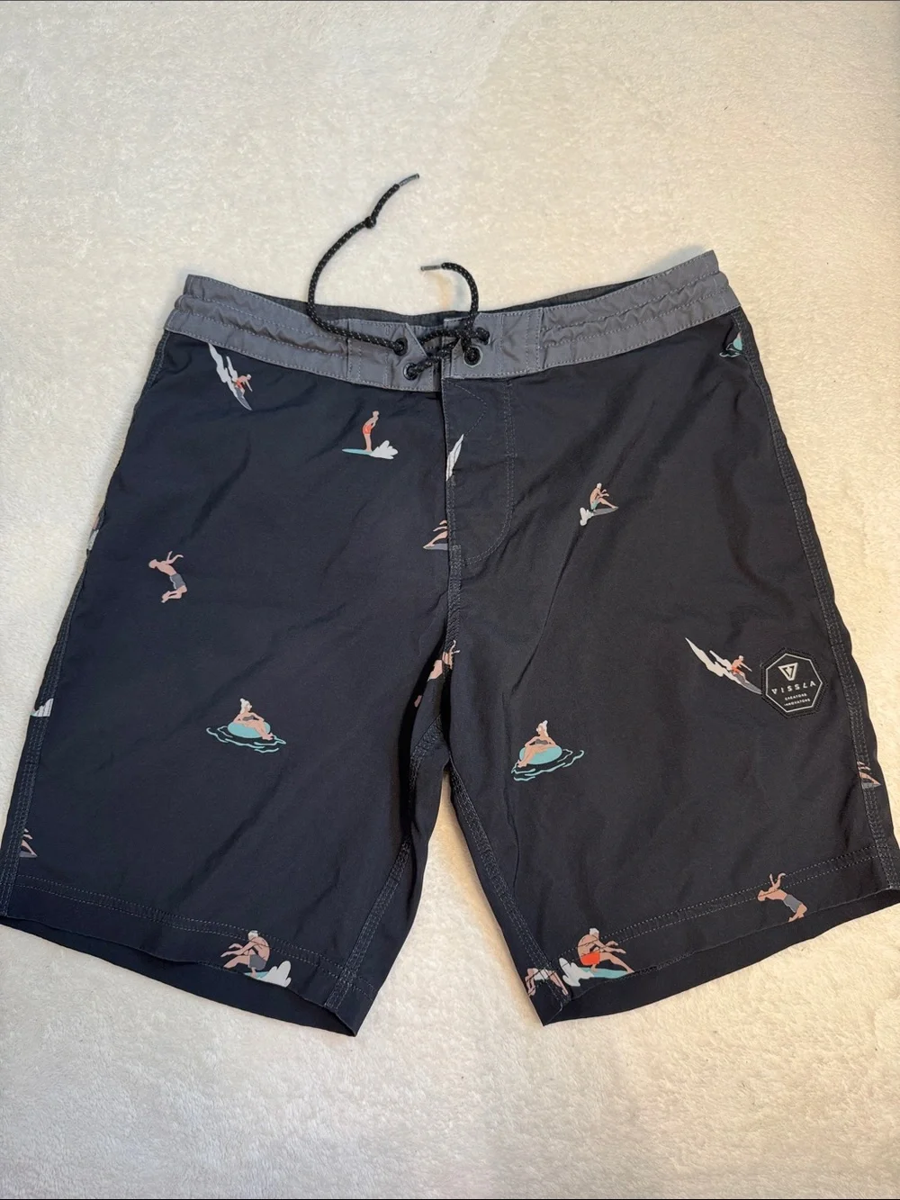 Vissla black patterned board shorts. 30.